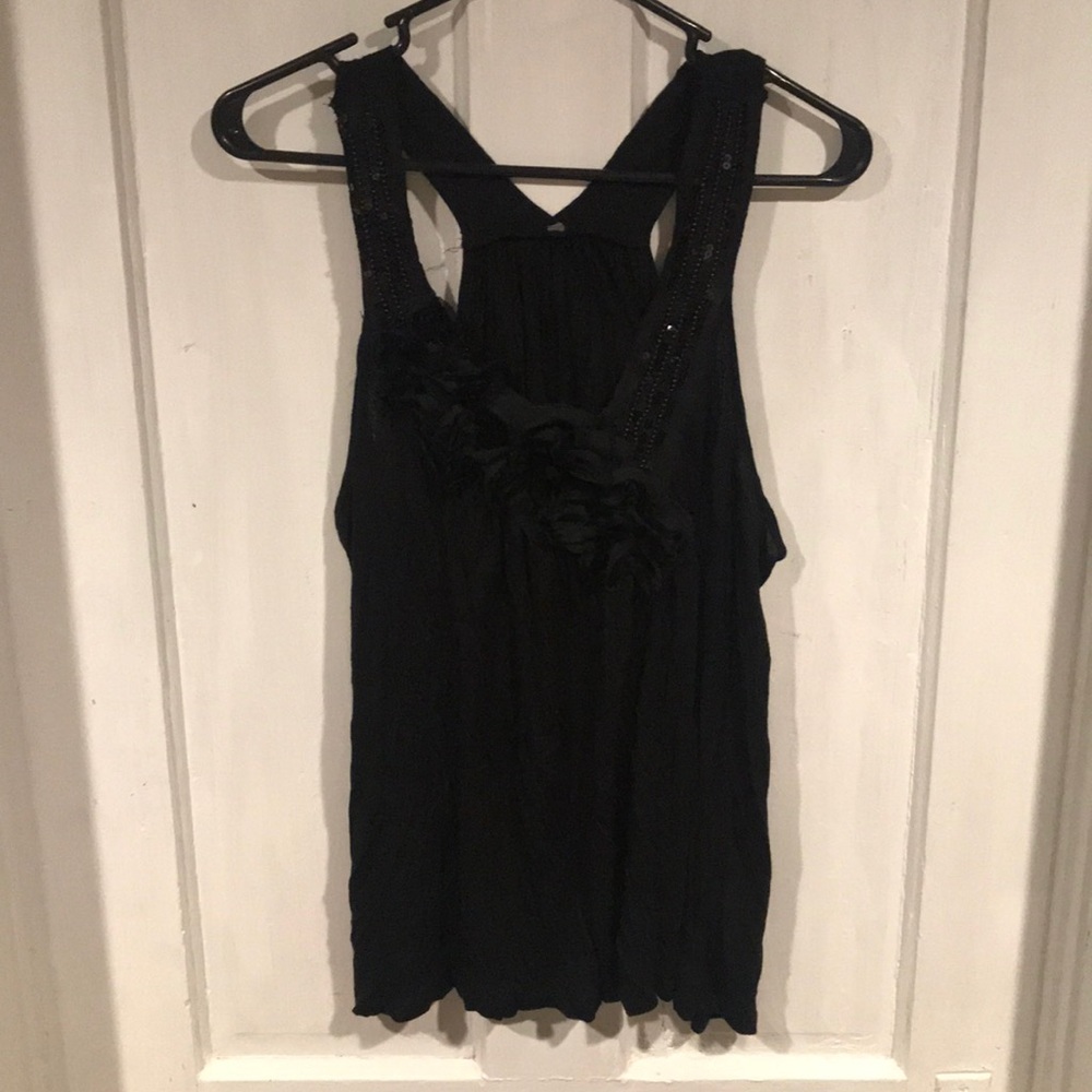 Black tank with floural accent at bust
